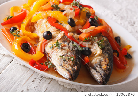 Mackerel in vegetable marinade close-up Mackerel in vegetable marinade close-up 23063876