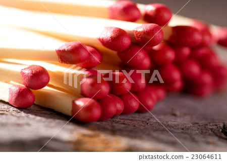 Several matchsticks with red heads 23064611
