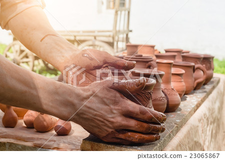 hands put crock 23065867