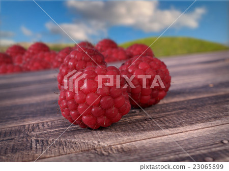 Raspberrieson wooden desk. 3D render Raspberrieson wooden desk. 3D render 23065899