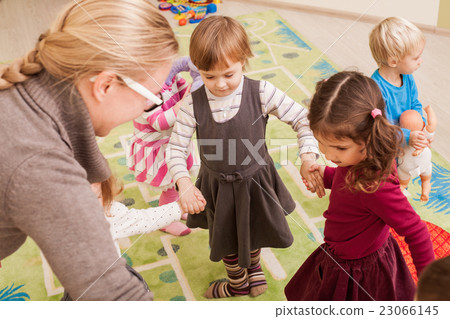Group of little children dancing  23066145
