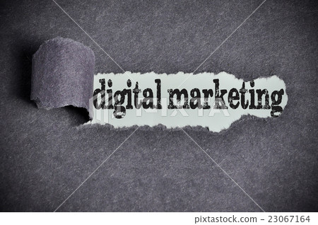 digital marketing word under torn black paper digital marketing word under torn black paper 23067164