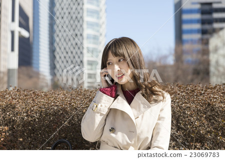 Outdoor Shinjuku business street background with business woman smart head Background Outdoor Shinjuku business street background with business woman smart head Background 23069783