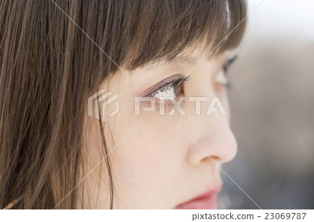Female portrait facial expression staring at gazing up 23069787