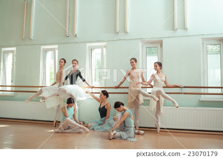 The seven ballerinas at ballet bar The seven ballerinas at ballet bar 23070179