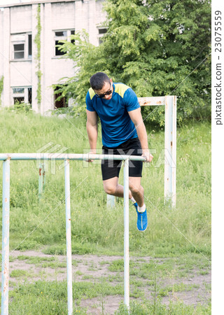 Strong young athlete Strong young athlete 23075559