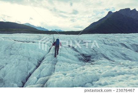 Hiker on glacier Hiker on glacier 23076467
