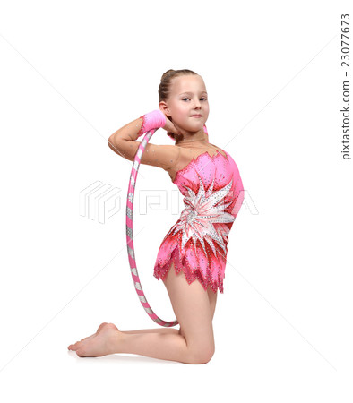 artistic athlete performs with hula hoop 23077673