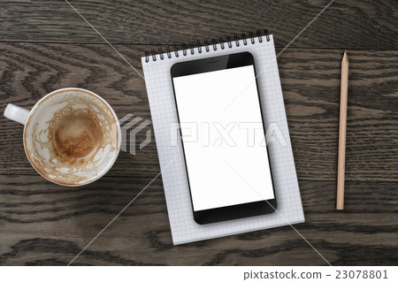top view of table with empty coffee cup smartphone top view of table with empty coffee cup smartphone 23078801