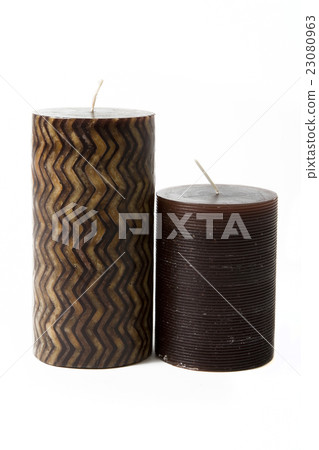 Brown color candles on background Brown color candles on background 23080963