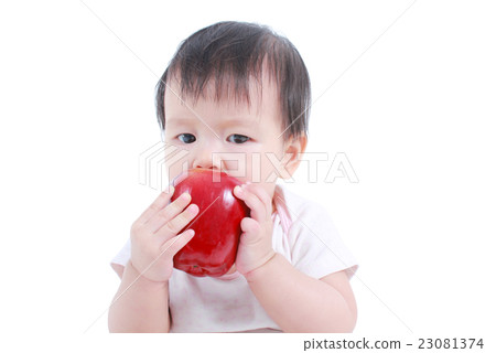 Cute baby with red apple (eating healthy food)  23081374