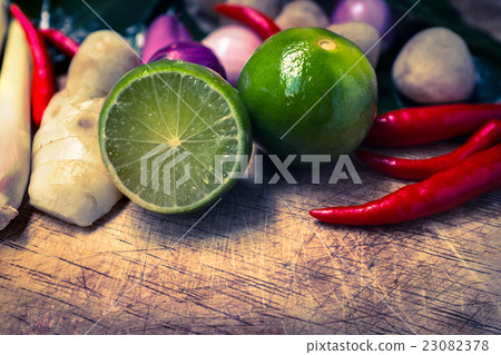 Close up kaffir lime leaf, lemon ingredients food. 23082378