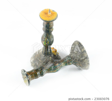 old brass plated candlestick isolated on white old brass plated candlestick isolated on white 23083076