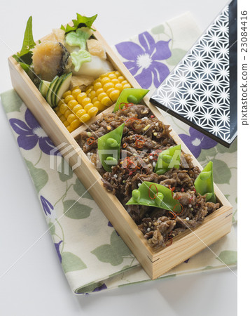 Japanese style boxed lunch in a wooden box 23084416