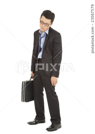 overwork  exhausted businessman holding briefcase 23087579