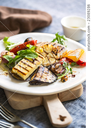 Grilled Halloumi with aubergine and pepper salad Grilled Halloumi with aubergine and pepper salad 23089286