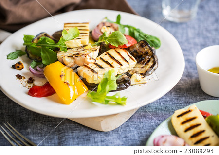 Grilled Halloumi with aubergine and pepper salad Grilled Halloumi with aubergine and pepper salad 23089293