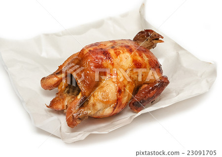 Roasted chicken on white paper Roasted chicken on white paper 23091705