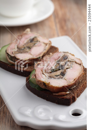 Rabbit and mushroom roulade 23094444