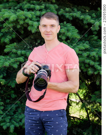 Professional male photographer Professional male photographer 23095900