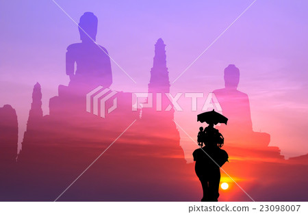 silhouette elephant with tourist and big buddha  23098007