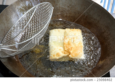 Frying Cooking Mughlai paratha Frying Cooking Mughlai paratha 23098402