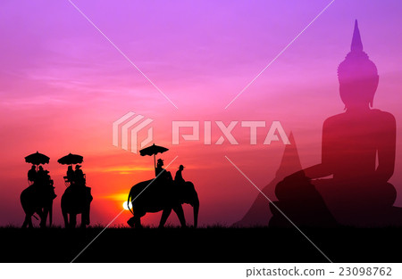 silhouette elephant with tourist with big buddha 23098762