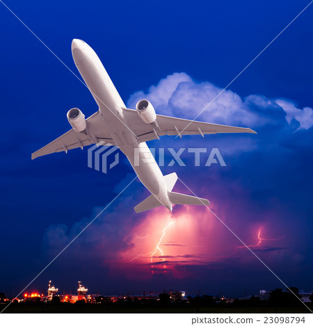 Commercial airplane fly on thunderstorm backgroud Commercial airplane fly on thunderstorm backgroud 23098794