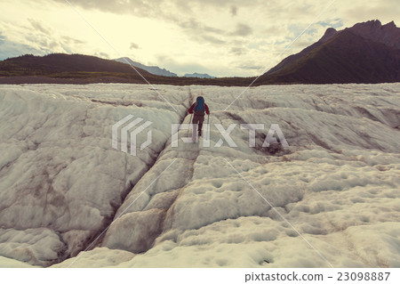 Hiker on glacier Hiker on glacier 23098887