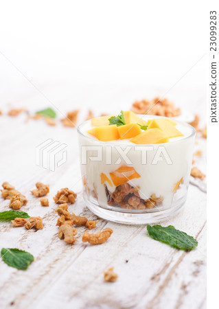 Homemade Mango Yoghurt Parfait with Granola Homemade Mango Yoghurt Parfait with Granola 23099283