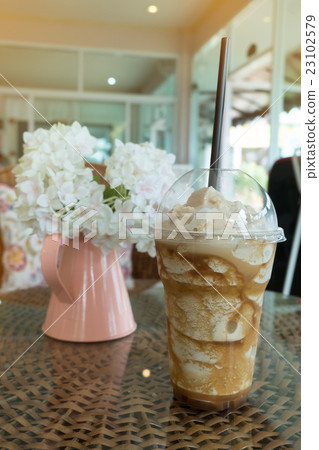 iced frappe coffee in plastic mug iced frappe coffee in plastic mug 23102579