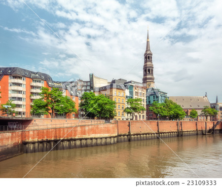 Hamburg quay with Catherine's church tower 23109333