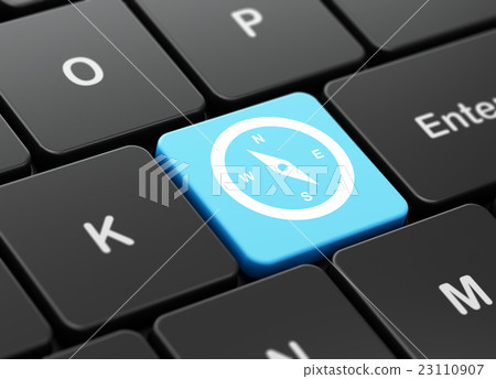 Travel concept: Compass on computer keyboard 23110907