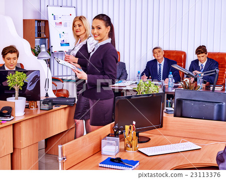 Happy group business people are printing out in Happy group business people are printing out in 23113376