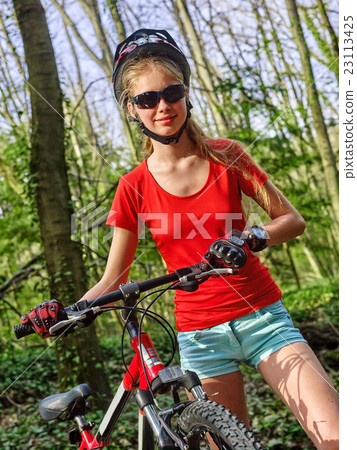 Bikes cycling girl into park. Bikes cycling girl into park. 23113425