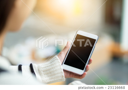 Woman hold with cellphone Woman hold with cellphone 23116668