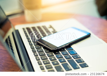 Lapotp and cellphone 23116674