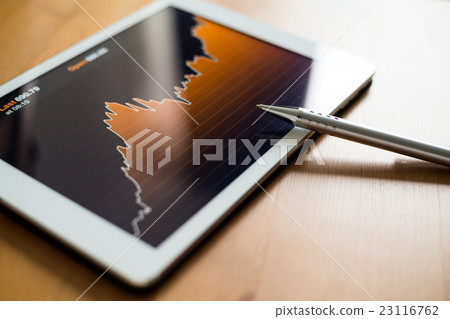 Digital tablet pc with stock market graph 23116762