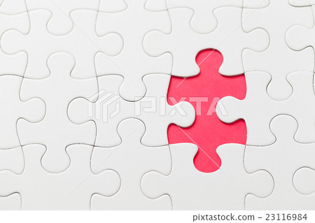 Jigsaw puzzle on red background Jigsaw puzzle on red background 23116984
