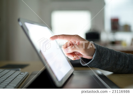 Woman use of digital tablet pc Woman use of digital tablet pc 23116986