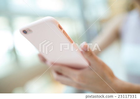 Human hand hold with cellphone 23117331