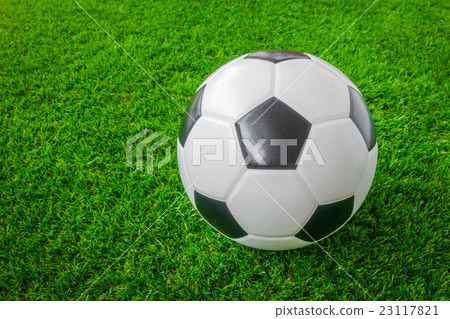Soccer ball on green grass . Soccer ball on green grass . 23117821