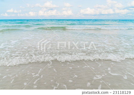 Beautiful white sand beach with blue sea and sky Beautiful white sand beach with blue sea and sky 23118129