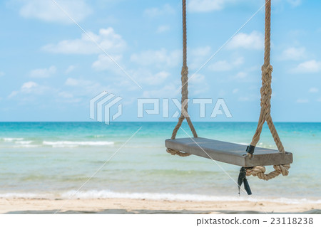 A swing on the beach A swing on the beach 23118238