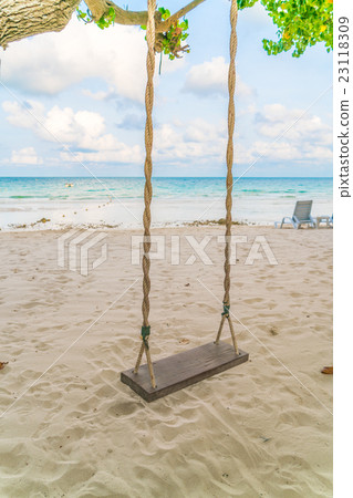 A swing on the beach 23118309