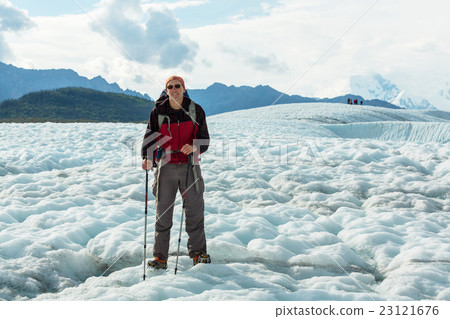 Hiker on glacier Hiker on glacier 23121676