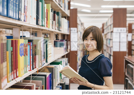 Studying in the library Studying in the library 23121744