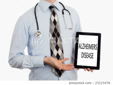 Doctor holding tablet - Alzheimers disease 23123476