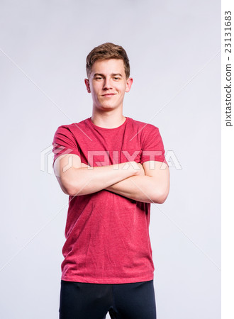 Boy in black sports trousers and t-shirt, studio Boy in black sports trousers and t-shirt, studio 23131683