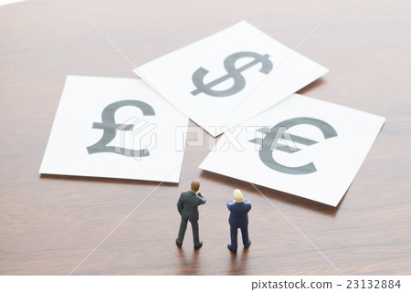 A businessman who thinks about currency exchange 23132884